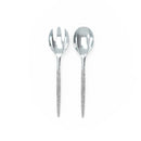 White and silver glitter plastic serving fork and spoon set displayed on a white background.