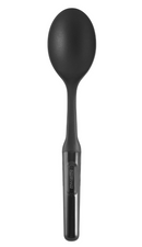 A black Farberware solid cooking spoon, made of nylon with a matte finish on the spoon head and a slightly glossy ergonomic handle.
