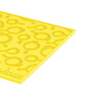 Lodge 7-inch red silicone hot pad and trivet, heat resistant, non-slip, featuring a textured cast iron pan design.