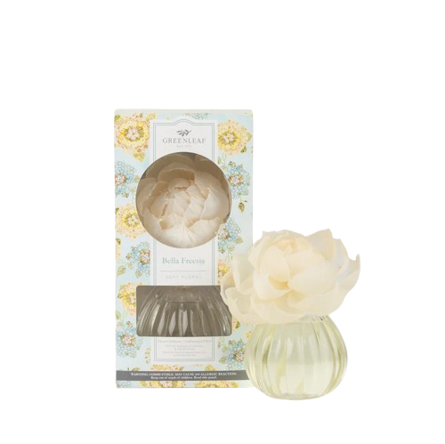 Greenleaf Bella Freesia flower diffuser with neutral-toned oil and a sola paper flower on a white background.