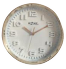 A round wall clock with a modern design, featuring white dial, raised 3D numbers, and metallic rim. The clock has a sleek hour, minute, and second hand, with the brand name 'HOME' displayed at the center.
