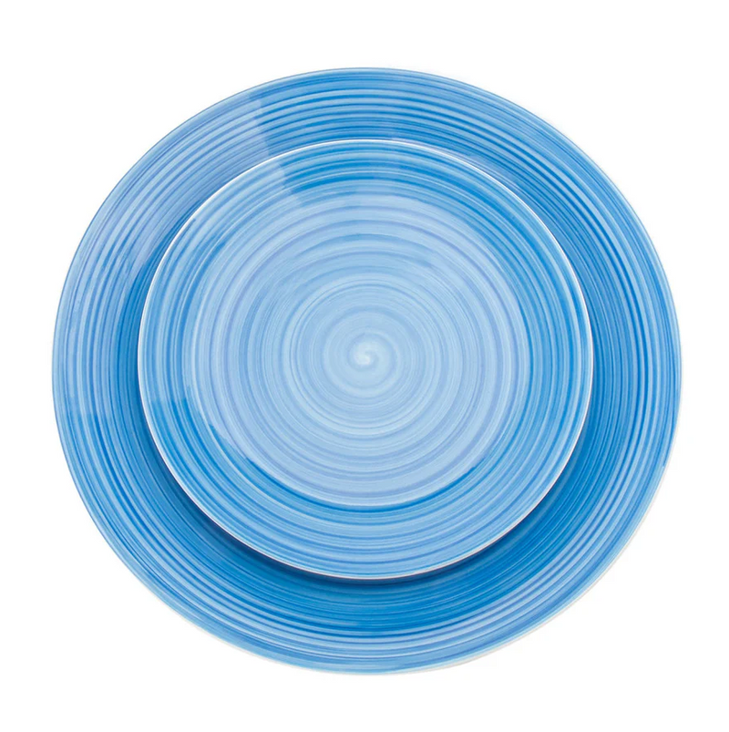 Top view of the Spiral blue porcelain 12-piece dinnerware set with plates and bowls featuring swirled watercolor patterns, displayed on a white background.