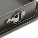 9-inch square non-stick springform pan with secure latch and black finish, shown on a white background.