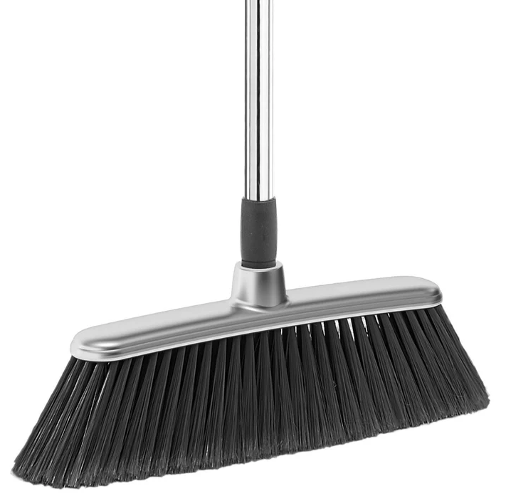 Classic broom with a metal handle and dense black bristles, shown standing upright on a white background.