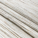 white jacquard napkin with a shimmering silver wave design