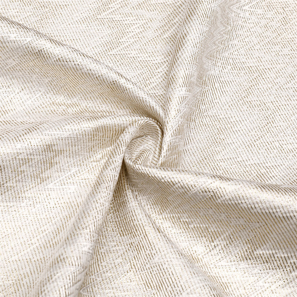 Rectangular gold jacquard zigzag tablecloth laid flat on a white background.