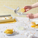 Chef'n FreshForce Lemon Squeezer in white and chrome, designed for maximum juice extraction from citrus fruits.