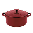A red enameled cast iron round casserole with matching lid and wide handles, shown on a white background.