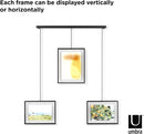 Chrome Umbra Exhibit picture frame set with three 8x10 floating frames suspended from a modern metal beam on a white background.