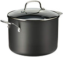 A black hard-anodized 8-quart stockpot with glass lid and stainless steel handles, shown on a white background.