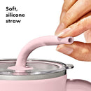 A tall, matte white OXO Strive XL tumbler with a clear lid, a white straw inserted, and a sturdy white handle on the side. The gray OXO logo is visible on the tumbler's body.