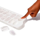 OXO Good Grips ice cube tray with sliding lid and rounded cube design on a white background.