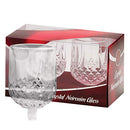 A 2-pack of clear glass candle holders with a diamond-cut crystal pattern on the lower half and a transparent peg base, packaged in a red box.