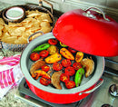 A round, red metal stovetop smoker with a high-domed lid, a built-in thermometer, and silver side handles.