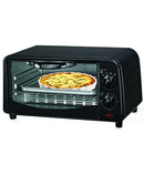 Black Courant 4-slice countertop toaster oven with a glass door showing a baking dish containing a cooked quiche inside. The oven has two control knobs on the right and a red indicator light at the bottom.