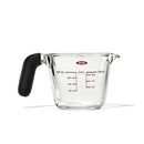 OXO Good Grips 1-cup borosilicate glass measuring cup with clear markings and black non-slip handle shown on a white background.