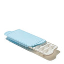 OXO Good Grips ice cube tray with sliding lid and rounded cube design on a white background.