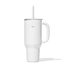 A tall, matte white OXO Strive XL tumbler with a clear lid, a white straw inserted, and a sturdy white handle on the side. The gray OXO logo is visible on the tumbler's body.