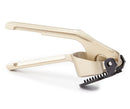 A gold-toned Farberware garlic press with a sturdy cast construction. 