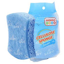 A light blue rectangular cellulose sponge is displayed next to its light blue and white packaging. The packaging features the "Kosher Cook" logo, "CELLULOSE SPONGE," and "DAIRY" labels.