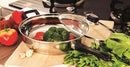 Sauté Pan with Lid, Stainless Steel, with Black Handle, on Wooden Surface