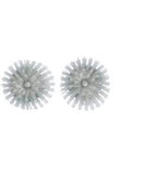 OXO Steel Soap Dispensing Palm Brush for dishwashing, with sturdy stainless steel bristles and an integrated soap reservoir.