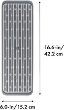 Light gray rectangular silicone drying mat with raised ridges for efficient drying.