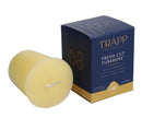 Trapp No. 08 Fresh Cut Tuberose 2 oz votive candle beside original packaging, displayed on a white background.