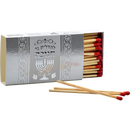 Box of Ner Mitzvah brand extra-long matches specifically designed for lighting the Chanukah menorah. The white and silver box features Hebrew text and a menorah illustration. Several matches with red tips are shown outside the box.