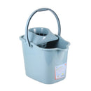 
The image shows a light blue/grey plastic bucket with a matching handle. It has a square-ish shape with a pouring spout on one side. The label on the front indicates it's a "PLASTIC BUCKET" and possibly shows a capacity of "12" (likely liters or quarts). It appears to be a general-purpose utility bucket.