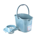 
The image shows a light blue/grey plastic bucket with a matching handle. It has a square-ish shape with a pouring spout on one side. The label on the front indicates it's a "PLASTIC BUCKET" and possibly shows a capacity of "12" (likely liters or quarts). It appears to be a general-purpose utility bucket.