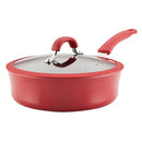 Red Rachael Ray Cook + Create 3-quart nonstick sauté pan with glass lid and wide cooking surface displayed on a white background.