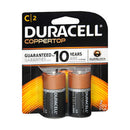 A black and yellow retail blister pack containing two Duracell Coppertop C batteries, with "GUARANTEED for 10 YEARS in storage" and "DURALOCK Power Preserve" visible on the packaging.