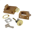 Secure brass-finish rim night latch by Ultra Hardware, offering automatic locking and a single cylinder deadbolt for exterior doors.