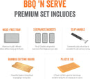 Yukon Glory BBQ 'N Serve Premium 7-piece set, featuring a grill basket, searing pan, bamboo cutting board, and orange serving tray.