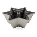 A cast aluminum Bundt pan shaped like the Star of David with intricate, recessed geometric lines and a nonstick interior.