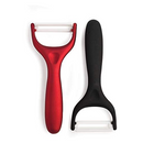 The Original Swiss Peeler by Kuhn Rikon, shown in red, with a durable carbon steel blade for easy vegetable and fruit peeling.