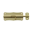 A polished brass barrel bolt latch consists of a rectangular mounting plate with decorative curved edges and four screw holes. A cylindrical bolt slides horizontally within a channel on the plate, controlled by a small handle. The bolt extends to engage with a separate staple or receiver plate, also made of brass and featuring two screw holes for mounting.