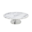 A sophisticated round marble cake stand featuring a smooth white surface with natural black veining. Designed with a sturdy pedestal base for stability, making it perfect for displaying cakes, pastries, and desserts. A stylish addition to any kitchen or dining setting.