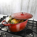 Red enameled 7-quart cast iron Dutch oven with matching lid.