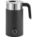
ZWILLING Enfinigy Milk Frother, a sleek black and silver electric frother with a handle and control dial on the front, perfect for creating foamy milk for coffee and other beverages.