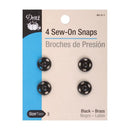 Dritz 4-pack black sew-on snaps in retail card packaging.