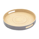 Handmade round bamboo tray with light wood interior and gray painted exterior, featuring cutout handles.