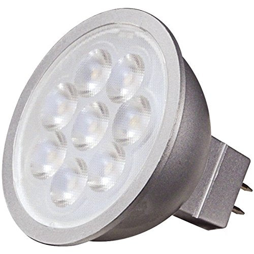 A close-up of a Satco LED light bulb from the Pack of 24 S9498 series displays a silver casing with seven small circular lights arranged in a hexagonal pattern. The 6.5MR16/LED/40'/40K/12V bulb features two protruding prongs at the base for connection.