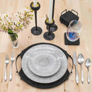 Silver flatware set including dinner fork, salad fork, knife, soup spoon, and dessert spoon.