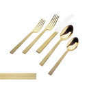 Luxurious gold flatware set with textured handles. Elegant and modern silverware perfect for upscale dining and special occasions.
