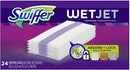 A purple and blue box of Swiffer WetJet mopping pads. The box features the Swiffer logo in green and blue, and the word "WETJET" in white. A stack of white rectangular mopping pads with purple stripes is shown in the center. A small circular icon with a lock and arrow pointing upwards is next to the text "ABSORB + LOCK MULTI-SURFACE," which is displayed next to three small squares depicting wood, tile, and linoleum floors. The bottom left corner indicates "24 MOPPING PADS" and dimensions.