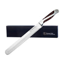 Hammer Stahl 10-inch slicing knife with granton edge, featuring a high-carbon stainless steel blade and a polished pakkawood handle. Displayed with an elegant black storage box.
