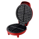 Red compact waffle maker with non-stick cooking plates.