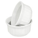 Set of two white 4-ounce CorningWare French White ramekins on a white background.